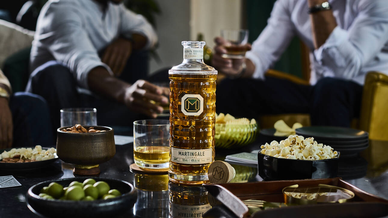 Casual gathering moment around Martingale Cognac